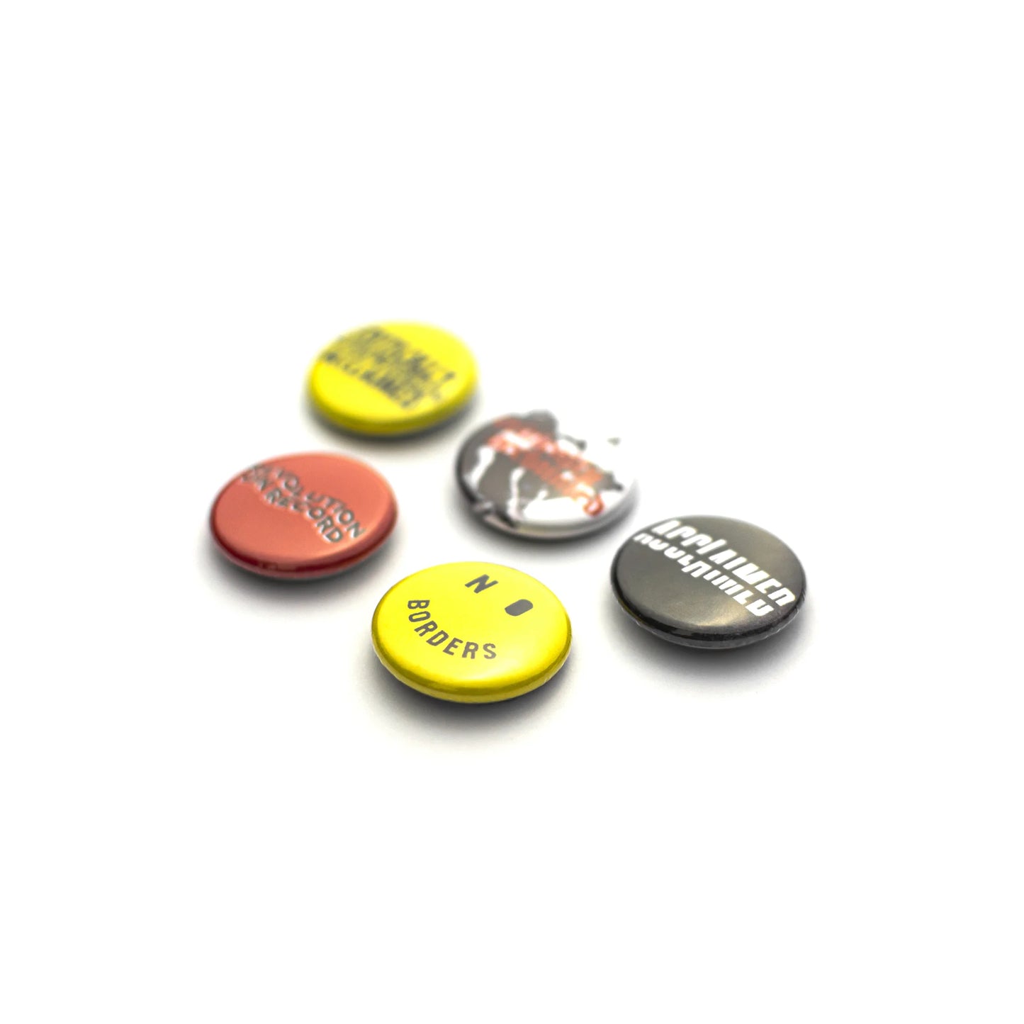 Revolution 5 Button Badge Pack Angle